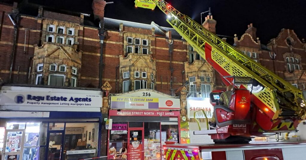 East Ham High Street North closed by fire: 60 firefighters